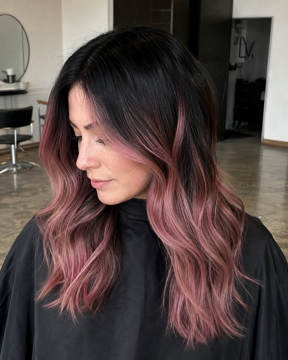 Black shadow roots with softly blended dusty-pink balayage