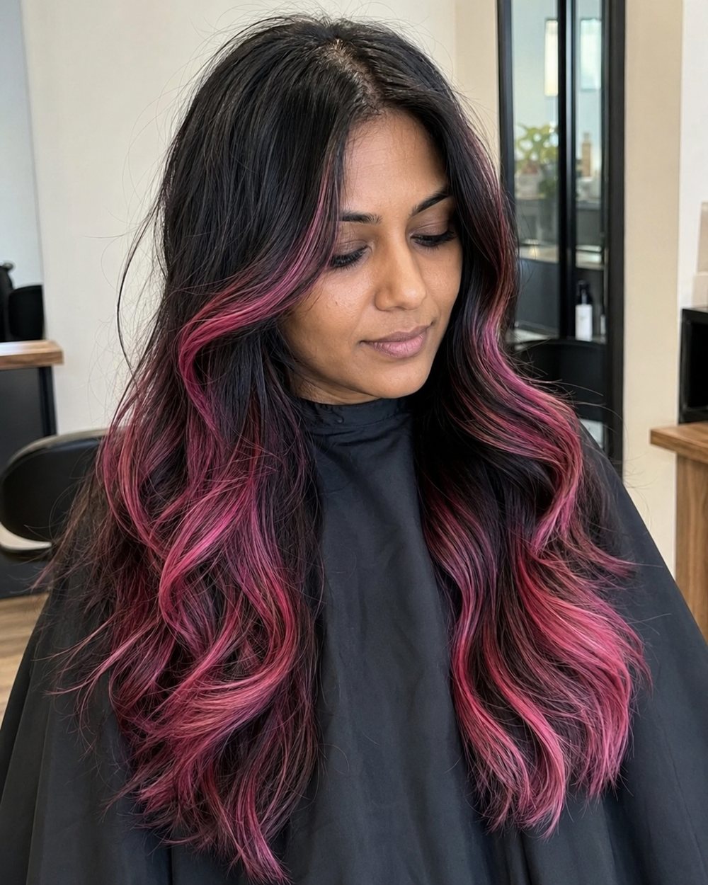 Long black waves with hand-painted pink balayage ribbons