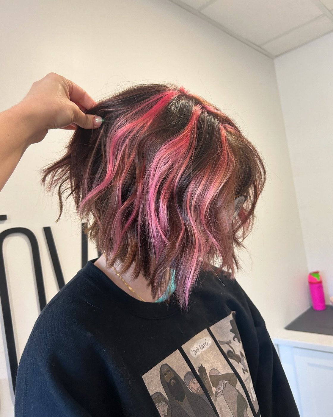 Chunky pink highlights brown bob