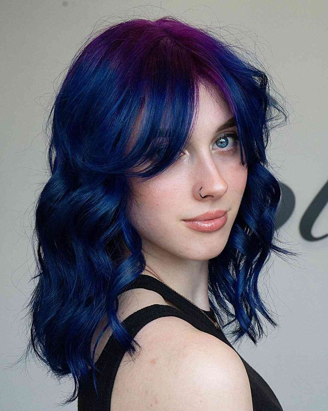Galaxy inspired midnight blue and purple hair with a dark violet crown
