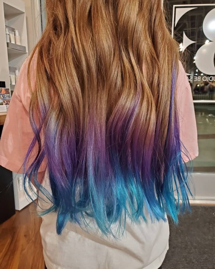 Long blonde hair with purple and blue dip dyed ends