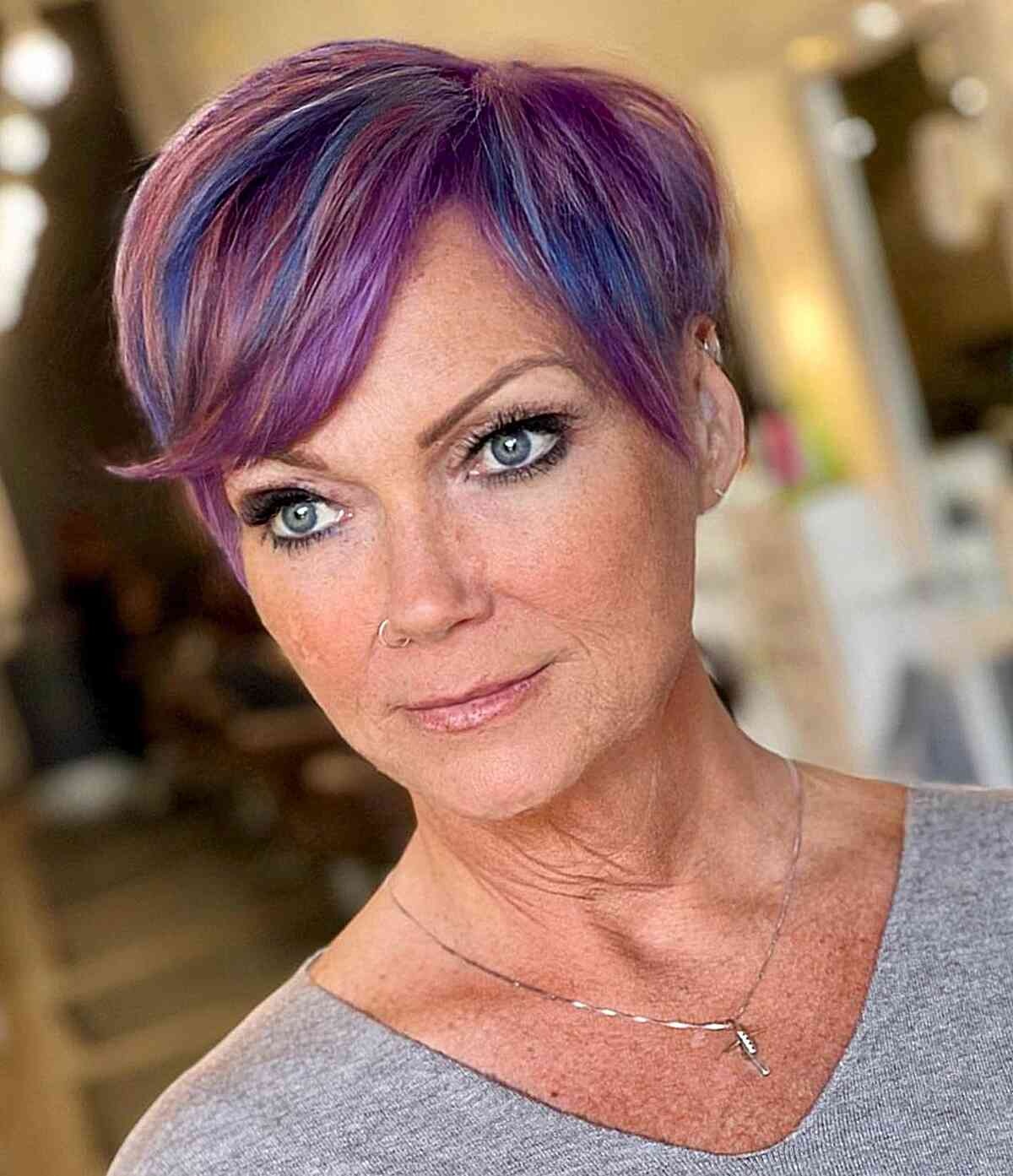 Textured blue and purple pixie cut with side swept bangs